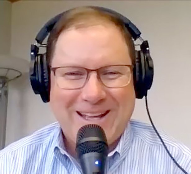 man with headphones ohio business podcast
